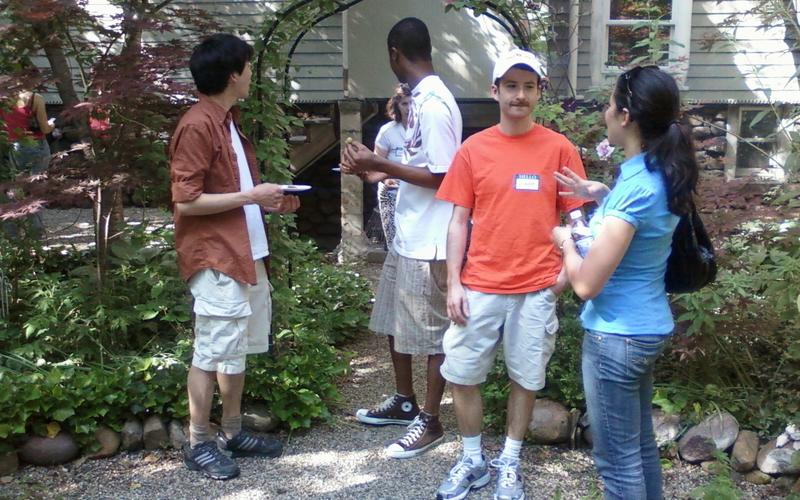 Group of students talking to one another