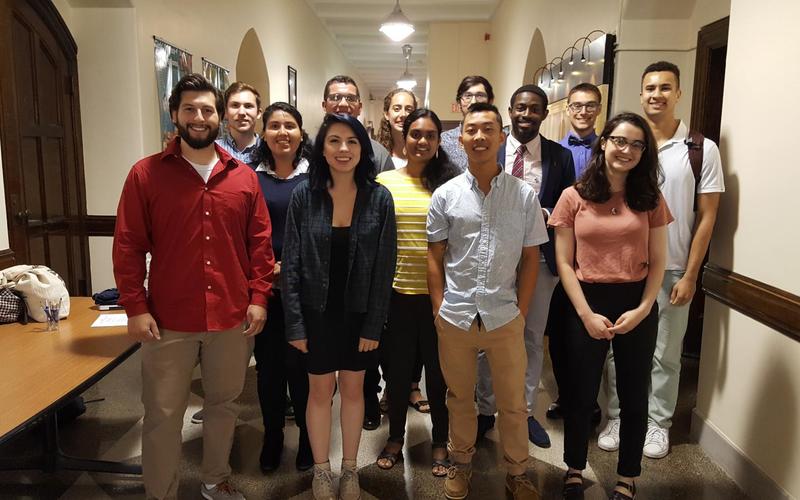 Group of REU students in professional attire