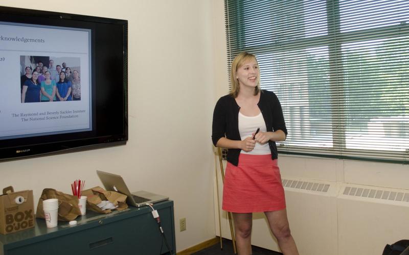 Undergraduate student talking during her oral presentation