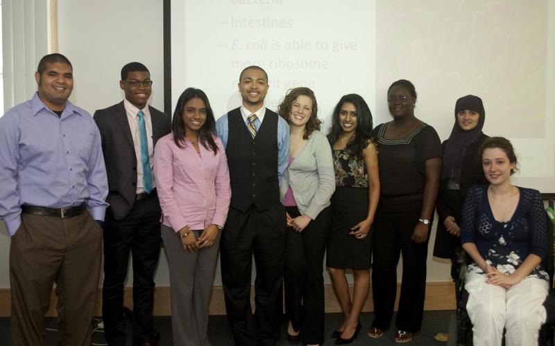 Undergraduate researcher group in professional attire