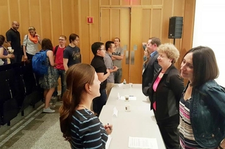 REU students talking with a panel speaker 