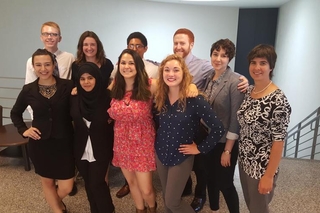 REU cohort group in professional attire