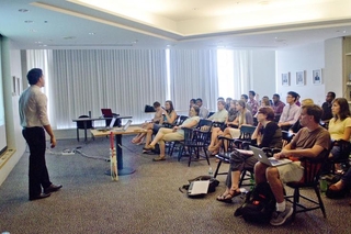 Undergraduate student talking during his oral presentation