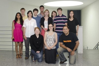 REU cohort group in professional attire