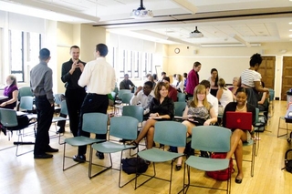 Audience watching a talk