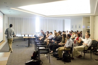 Undergraduate student talking during his oral presentation