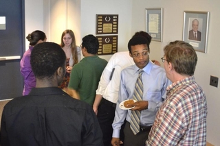 Group of people talking to one another