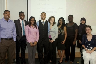 Undergraduate researcher group in professional attire